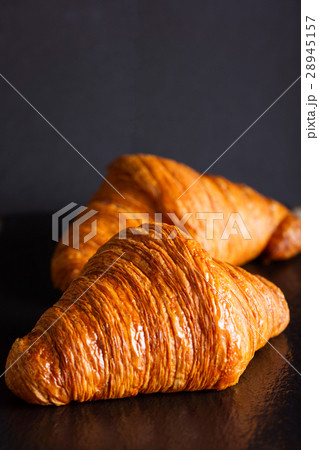 two crunchy croissants two crunchy croissants 28945157