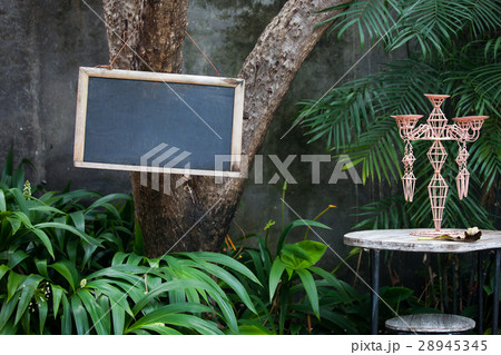 Blank menu Board on the tree in the garden Blank menu Board on the tree in the garden 28945345