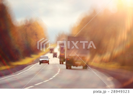 background blur road autumn sunbeams glare background blur road autumn sunbeams glare 28949323