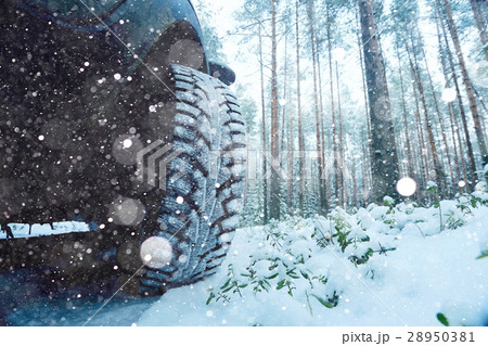 Winter car wheel studs, the concept of winter car ride 28950381