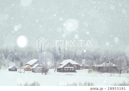 rural landscape with small houses on a snowy day 28953191