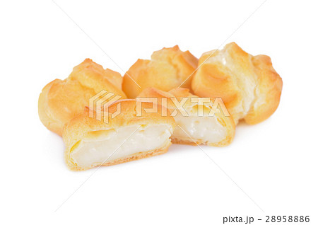 eclair or cream puffs with vanilla custard 28958886