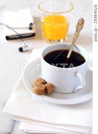 Morning coffee, orange juice and mobile phone 28964028