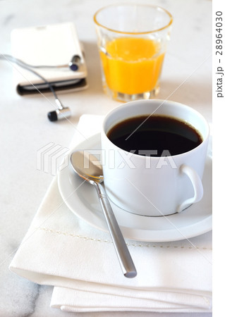 Morning coffee, orange juice and mobile phone 28964030