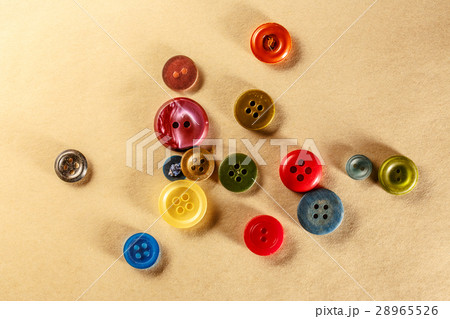Pile of colourful buttons 28965526