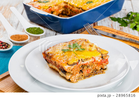 portion of delicious moussaka on plate, close-up portion of delicious moussaka on plate, close-up 28965816