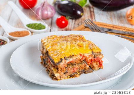 portion of delicious moussaka with parsley portion of delicious moussaka with parsley 28965818