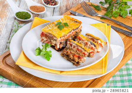portion of moussaka decorated with parsley portion of moussaka decorated with parsley 28965821