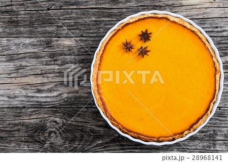 Fresh round bright orange pumpkin pie Fresh round bright orange pumpkin pie 28968141