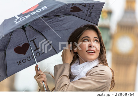 Woman Tourist Umbrella by Big Ben London England 28969764