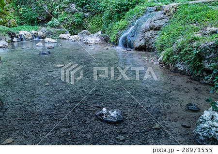 沖縄の名水 垣花樋川の清き湧き水の写真素材