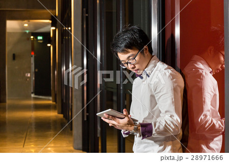 businessman using tablet in modern office businessman using tablet in modern office 28971666