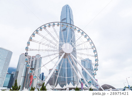 Hong Kong skyline panorama with Ferris wheel Hong Kong skyline panorama with Ferris wheel 28975421