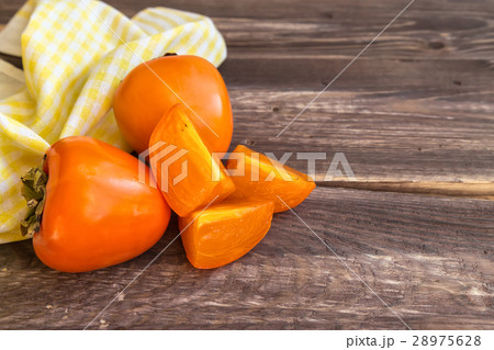 Delicious juicy persimmons 28975628