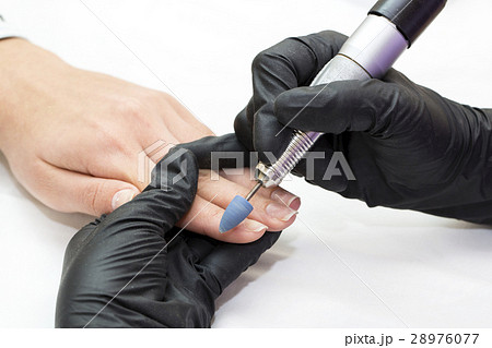 Woman hands doing manicure beauty salon close-up 28976077