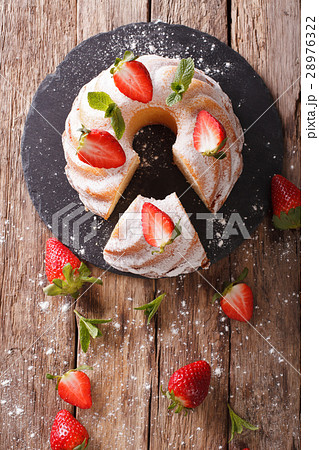 Pound Cake cake with mint and strawberry close-up 28976322