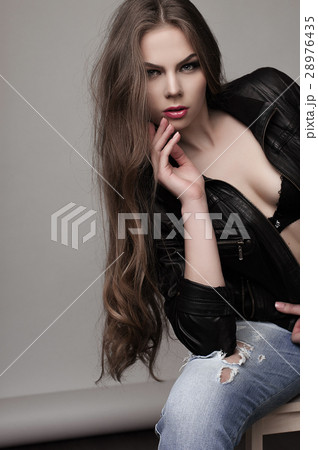 Young girl wearing black dress. Young girl wearing black dress. 28976435