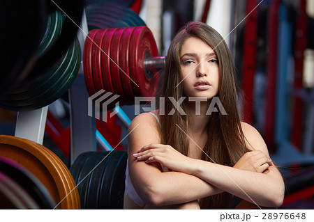 Beautiful girl take breath during fitness workout 28976648