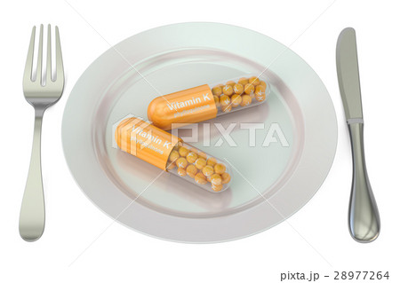 Diet and healthy meal concept Plate with vitamin K 28977264