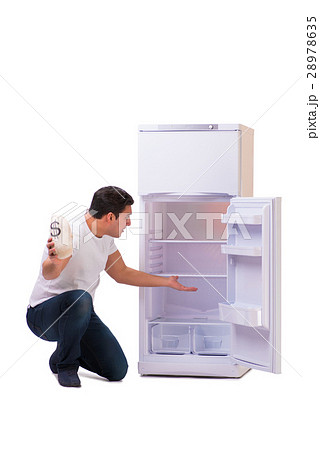 Hungry man looking for money to fill the fridge Hungry man looking for money to fill the fridge 28978635
