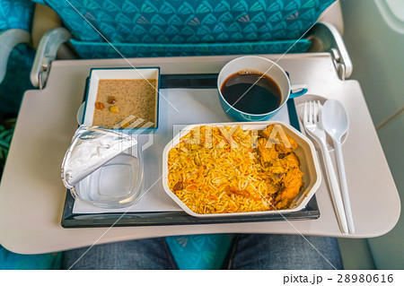Healthy food on the plane with coffee . Healthy food on the plane with coffee . 28980616