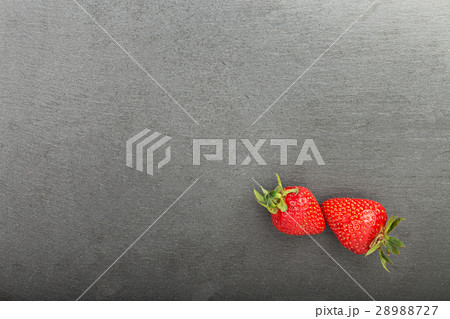 strawberries on a black background strawberries on a black background 28988727