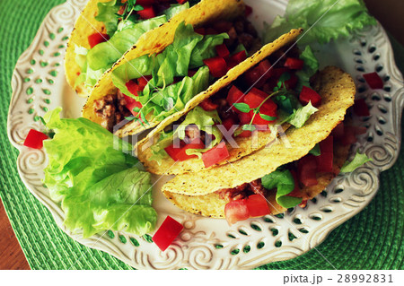 Grilled chicken legs on pan . Top viw. 28992831