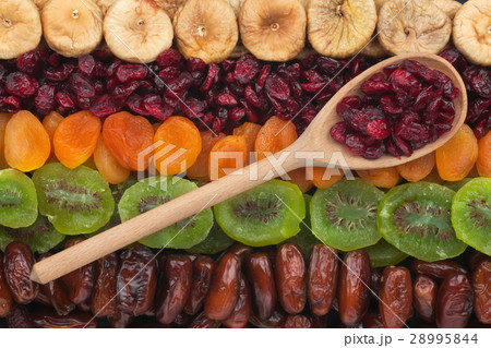 Wooden spoon with cranberries Wooden spoon with cranberries 28995844