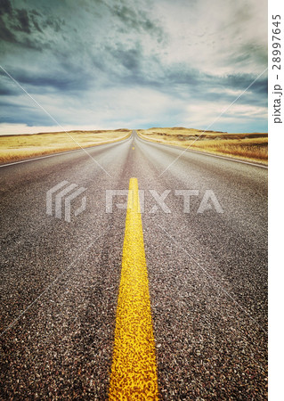 Highway lane close up retro toned picture. 28997645