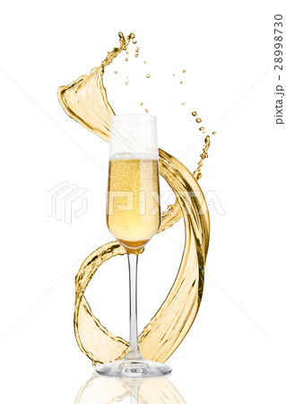 Glass of yellow champagne with splashes bubbles 28998730