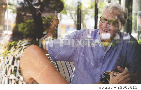 Mature couple enjoying coffee together 29003815