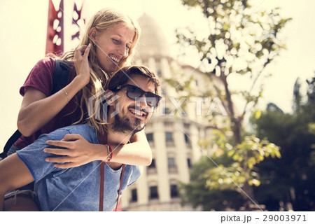 Sweet couple piggyback ride togetherness 29003971