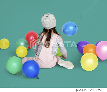 Little Girl Sitting Playing Balloon Portrait 29007516