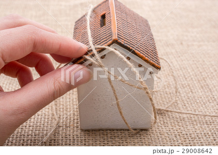 thread wrapped around a model house thread wrapped around a model house 29008642