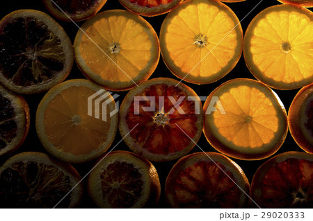 Fresh Juicy Orange Slices on Black Background 29020333