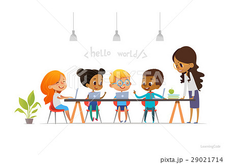 Happy children sitting at laptops and learning 29021714