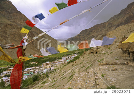 Ancient Buddhist Caves and Prayer Flags  29022071