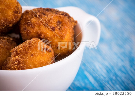 Detail of several pieces of fried cauliflower Detail of several pieces of fried cauliflower 29022550
