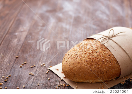 White bread in the baking paper and decorative 29024004