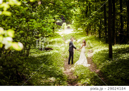 Groom and bride in the spring forest   29024184