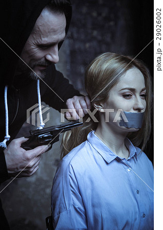 Strong independent woman unafraid of the threats 29026002