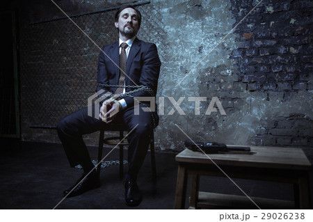 Inventive bank executive plotting an escape 29026238