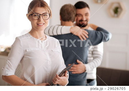 Delighted professional therapist smiling 29026705