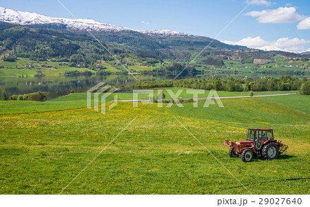 Small village at Vangsvatnet lake, Voss, Norway. 29027640