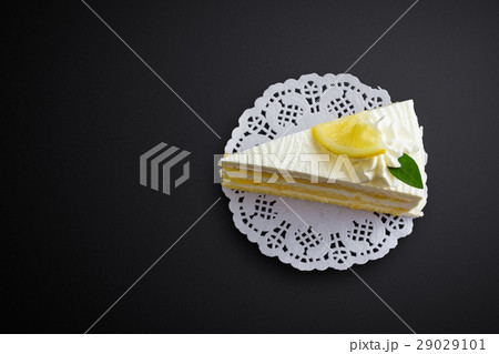 Lemon cake on black background Lemon cake on black background 29029101