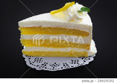 Lemon cake on black background Lemon cake on black background 29029102