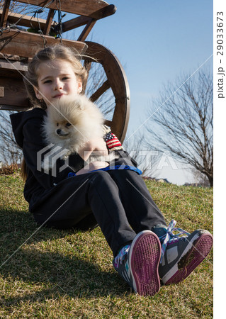 Image of young girl with her dog 29033673