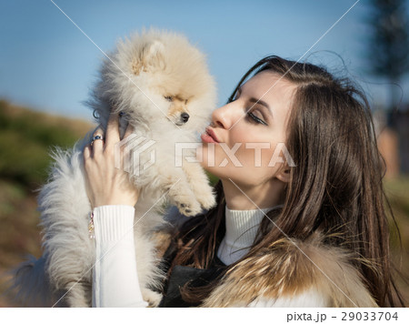 Image of young girl with her dog 29033704