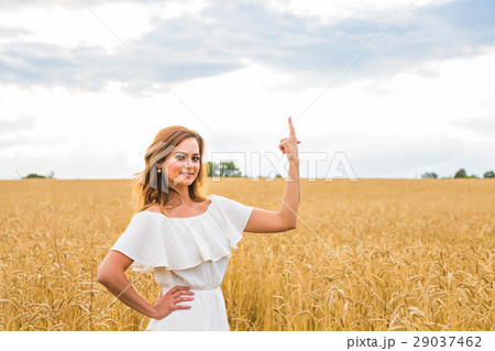 Happy travel woman smile to you and show something 29037462