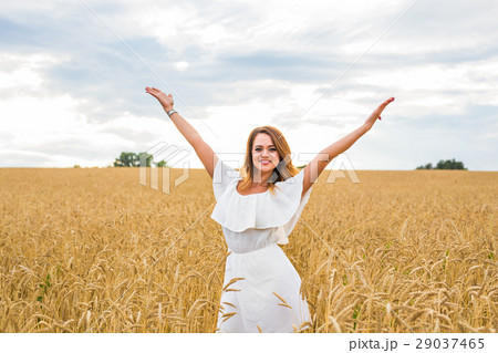 Beauty Girl Outdoors enjoying nature on the Field Beauty Girl Outdoors enjoying nature on the Field 29037465